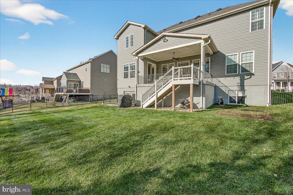 5487 Tallyn Ridge Drive Frederick, MD 21704 - Photo 63 of 80 a front view of a house with a yard