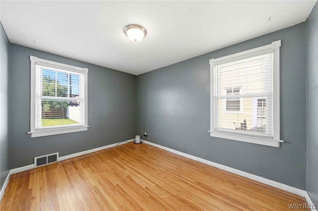 212 Treadwell Road Tonawanda, NY 14150 - Photo 14 of 39 Another 1st floor bedroom with hardwood floors