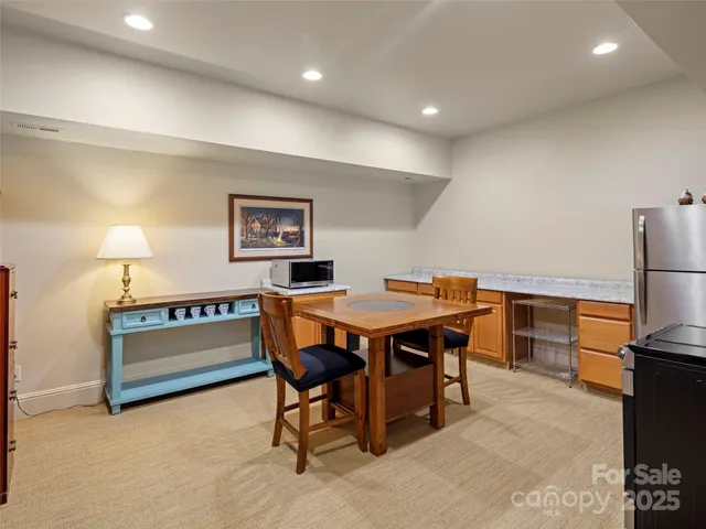 a view of a dining room with furniture