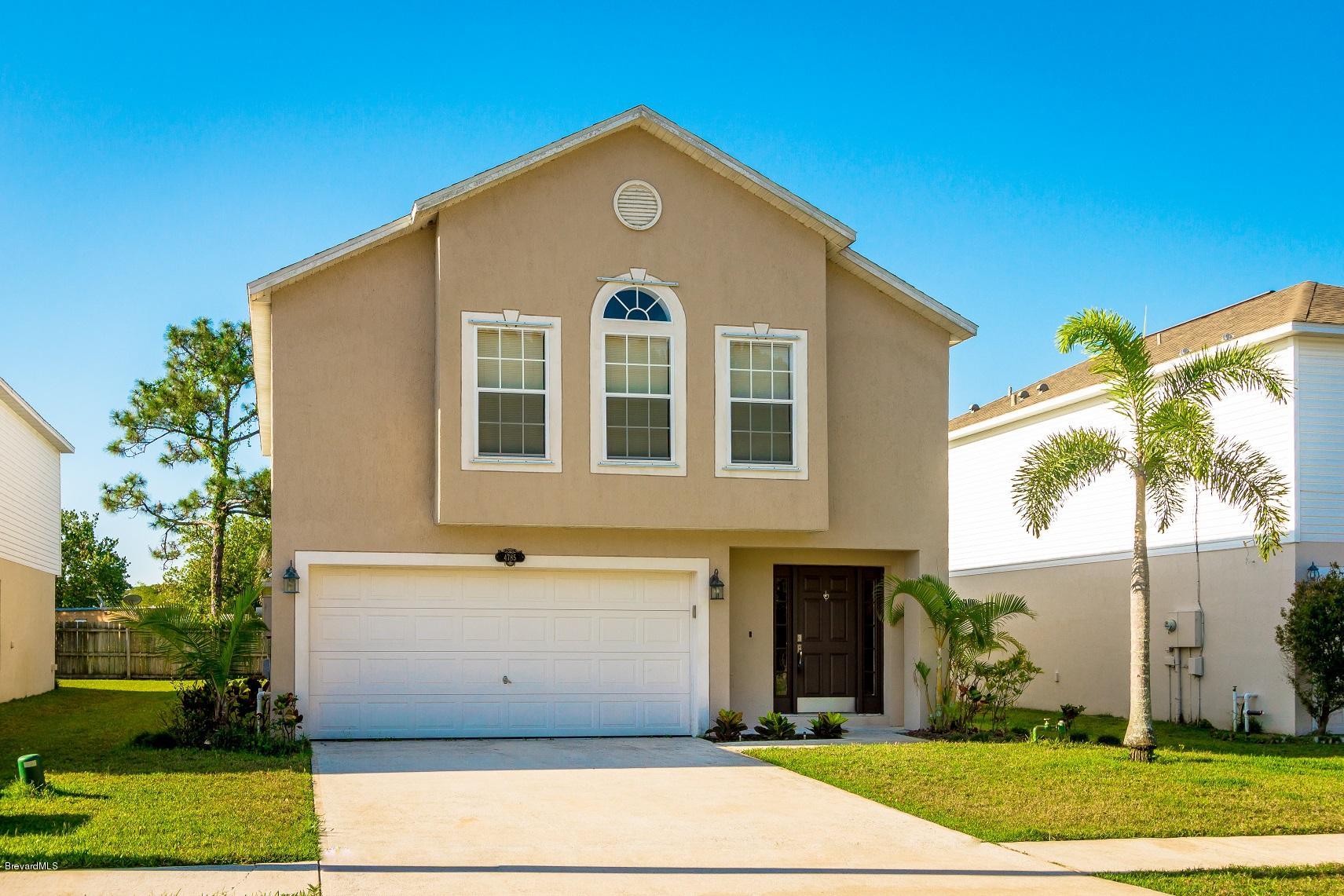 4785 Elena Way Melbourne, FL 32934 - Photo 1 of 19 front
