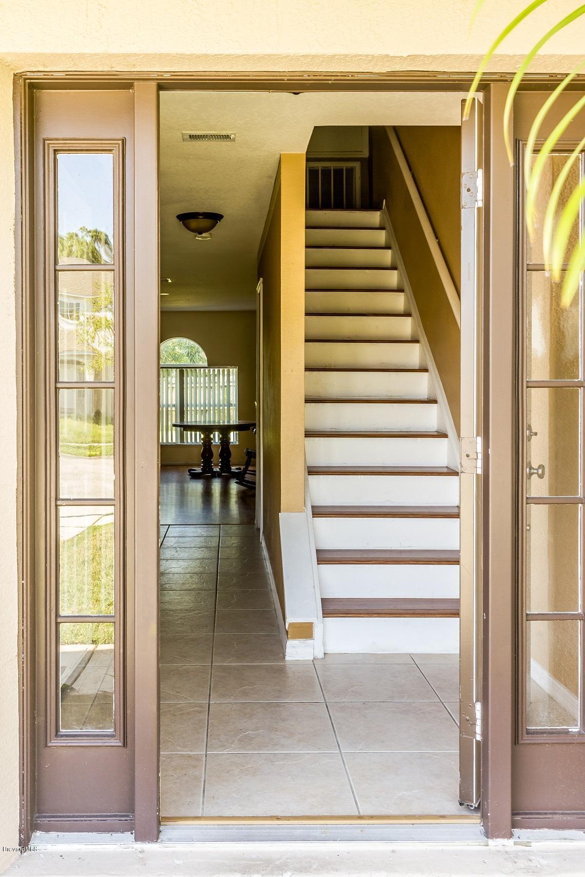 4785 Elena Way Melbourne, FL 32934 - Photo 2 of 19 front door