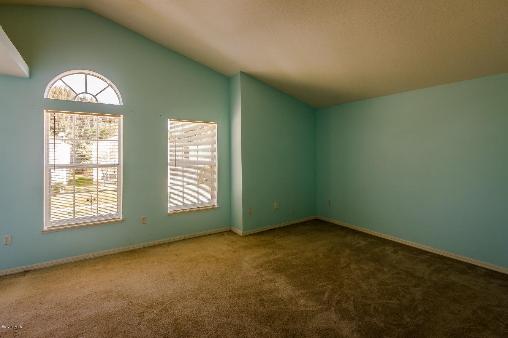 4785 Elena Way Melbourne, FL 32934 - Photo 15 of 19 Master bedroom