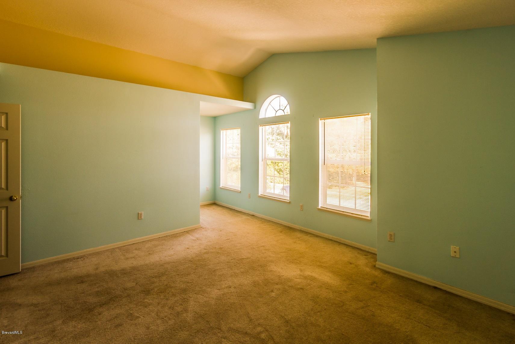 4785 Elena Way Melbourne, FL 32934 - Photo 16 of 19 Master bedroom