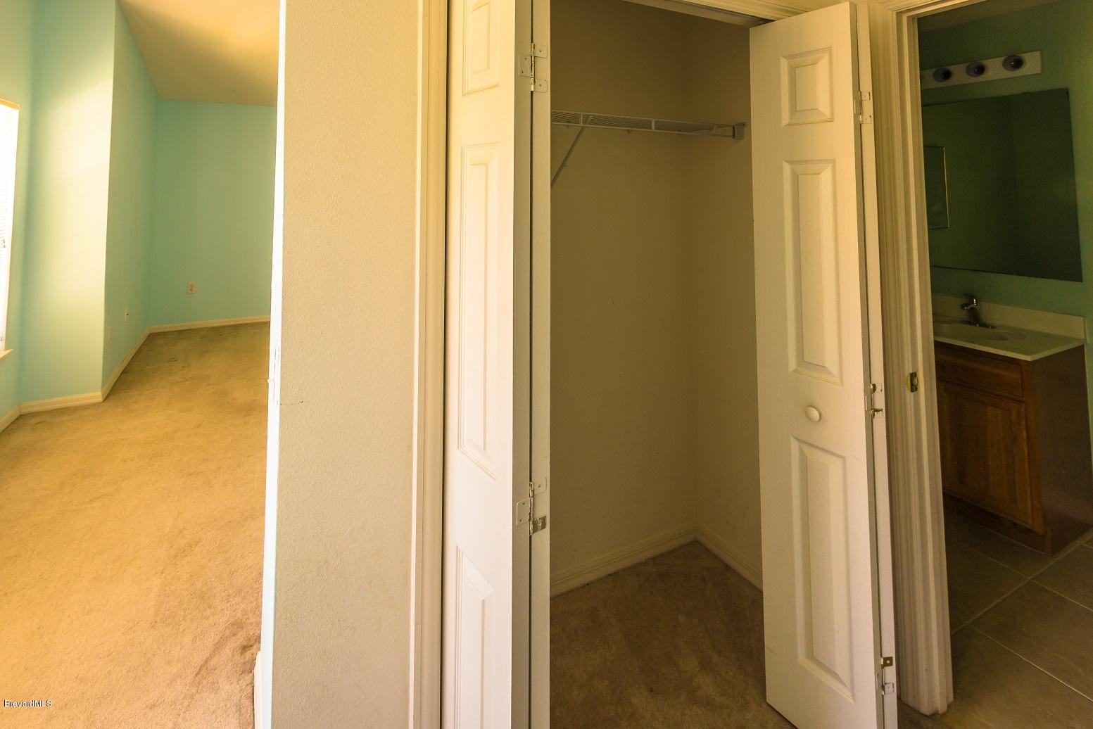 4785 Elena Way Melbourne, FL 32934 - Photo 18 of 19 Linen closet/Master bath