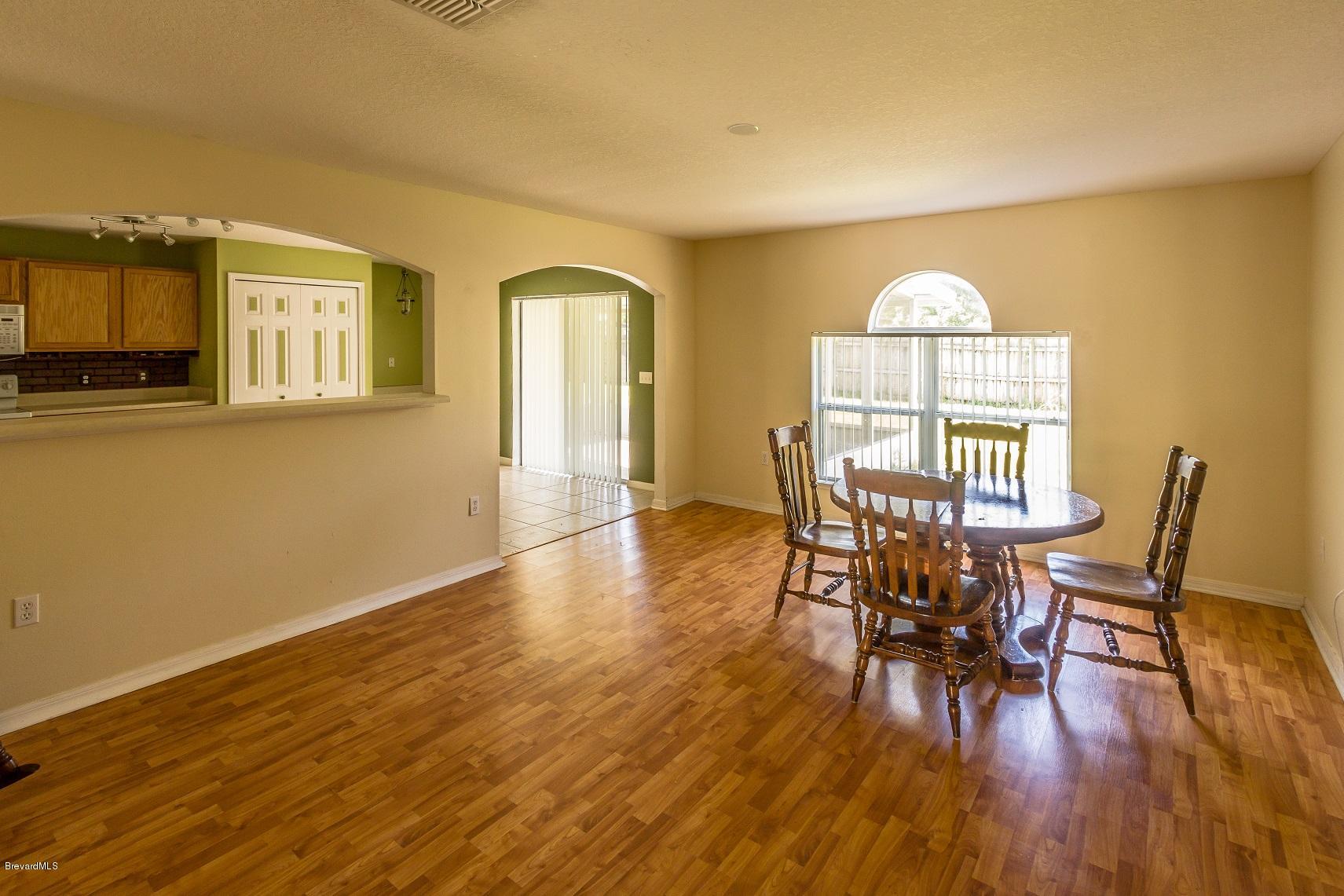 4785 Elena Way Melbourne, FL 32934 - Photo 3 of 19 Family/Dining room