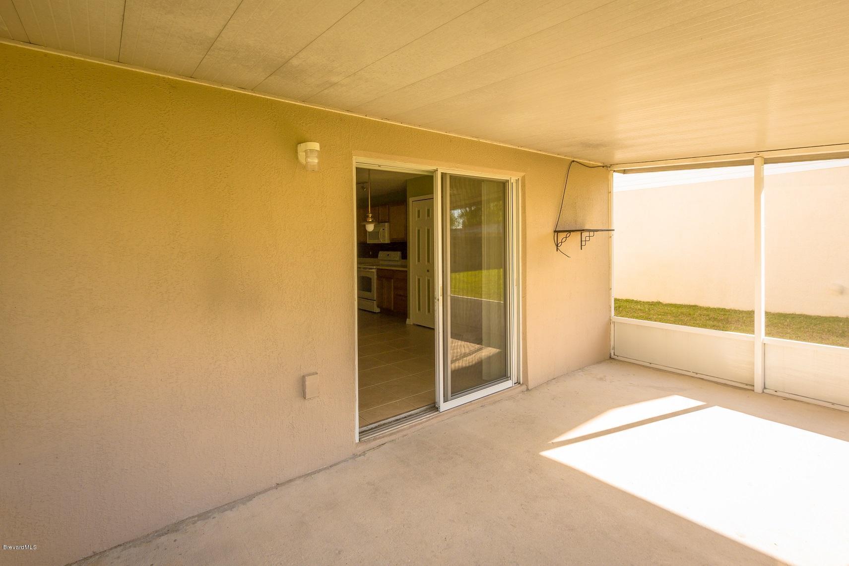 4785 Elena Way Melbourne, FL 32934 - Photo 8 of 19 Screened porch