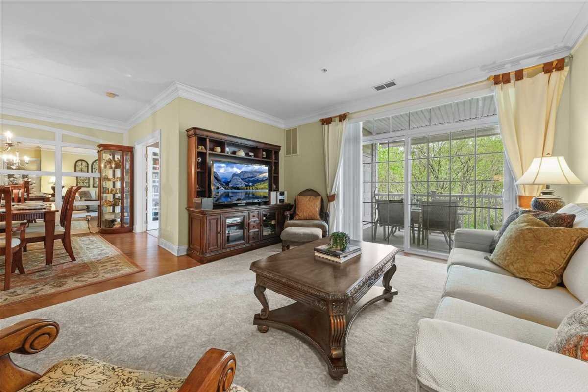123 Regency Drive Fishkill, NY 12524 - Photo 12 of 28 a living room with furniture and a flat screen tv