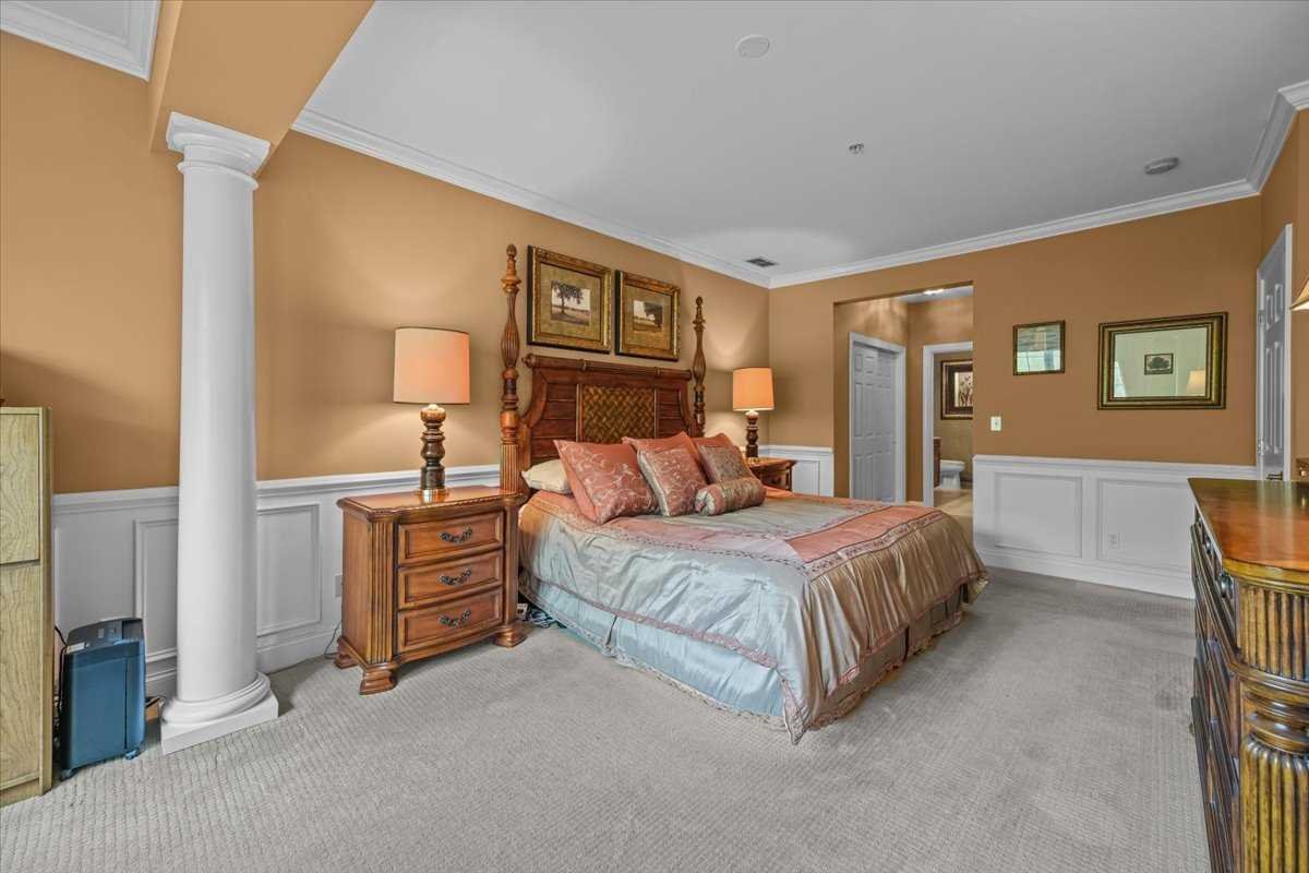 123 Regency Drive Fishkill, NY 12524 - Photo 16 of 28 a spacious bedroom with a bed and dresser