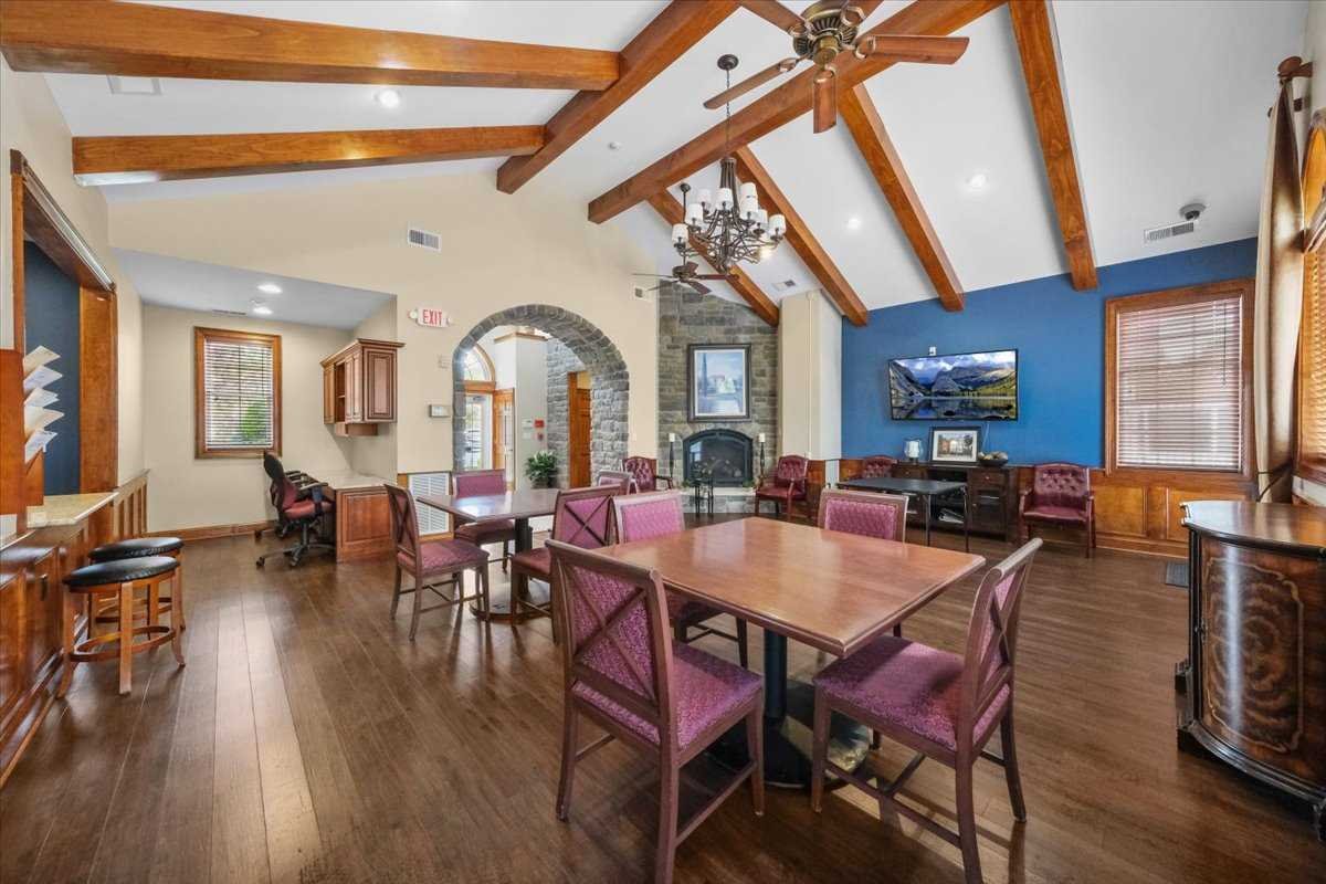 123 Regency Drive Fishkill, NY 12524 - Photo 25 of 28 a view of a dining room with furniture window and wooden floor