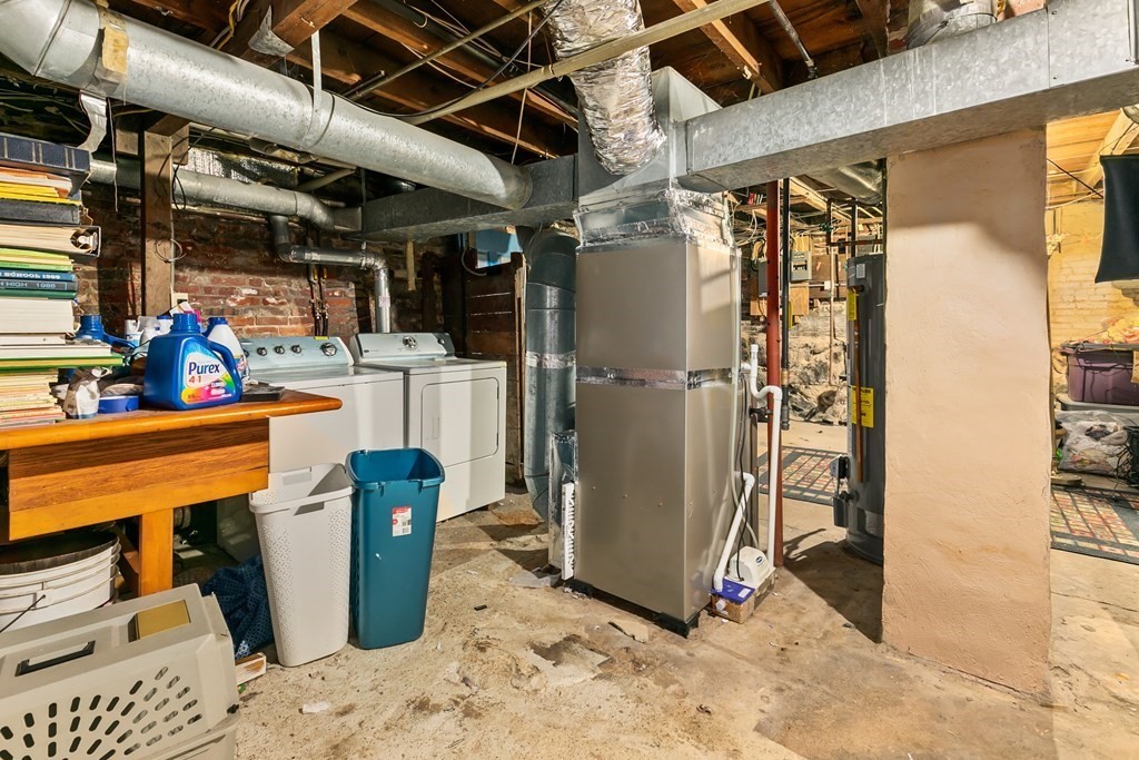44 Wright Street Stoneham, MA 02180 - Photo 16 of 38 a view of a storage room with shelves