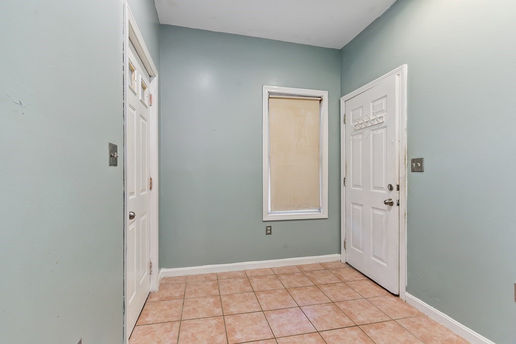 44 Wright Street Stoneham, MA 02180 - Photo 17 of 38 an empty room with windows