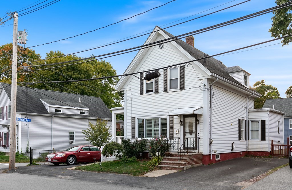 44 Wright Street Stoneham, MA 02180 - Photo 28 of 38 a car parked in front of a house