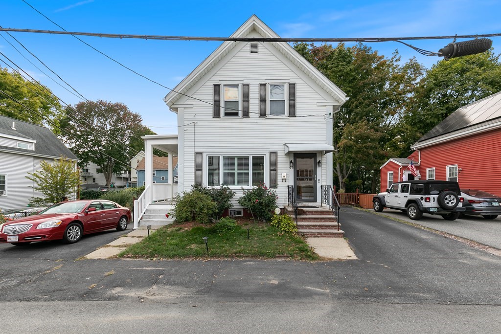 44 Wright Street Stoneham, MA 02180 - Photo 34 of 38 a view of a car parked in front of a house