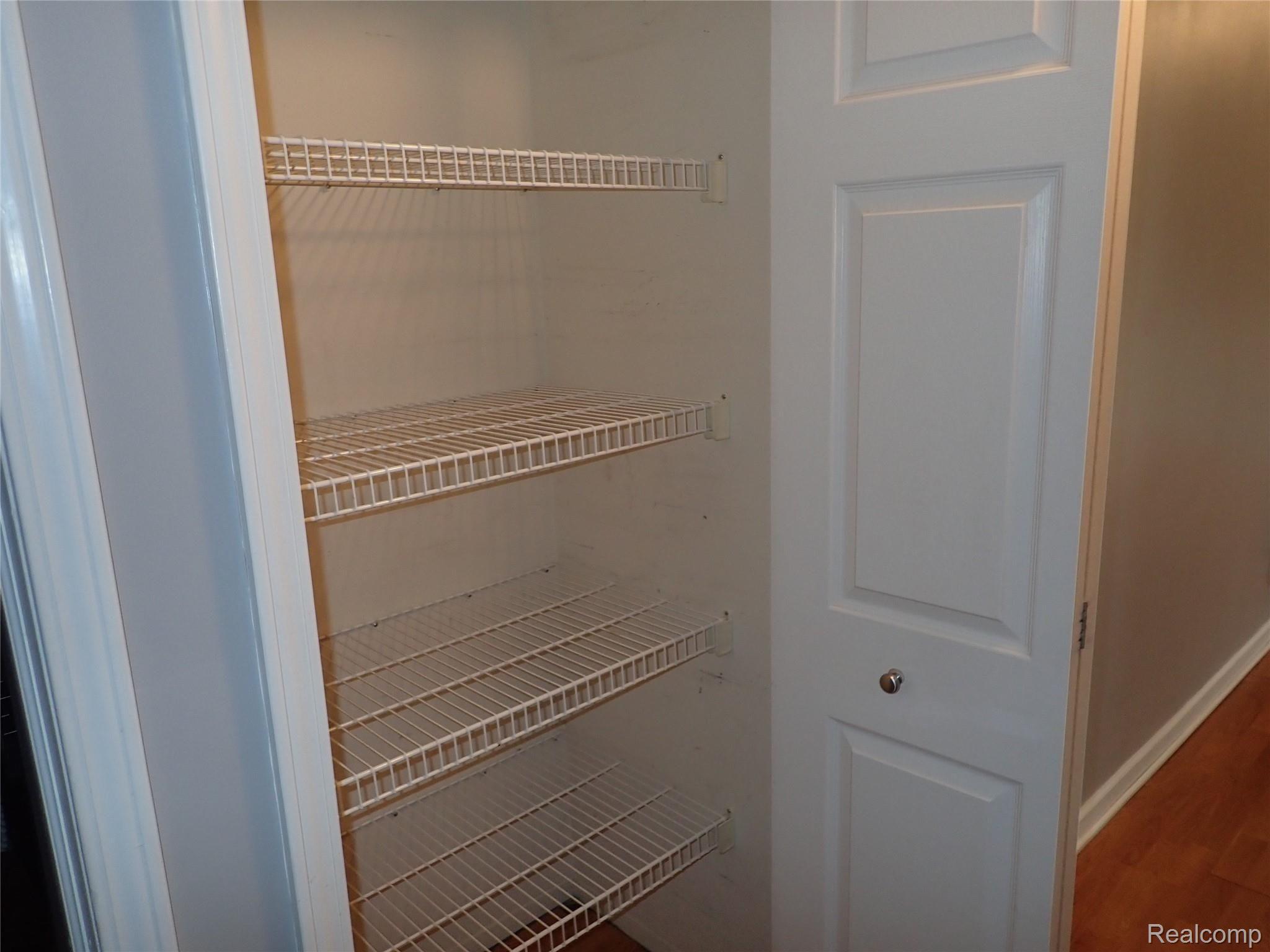 50 Pine Tree Ridge, Unit 4 Waterford, MI 48327 - Photo 18 of 25 Hall linen closet