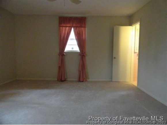 4667 Legion Road Hope Mills, NC 28348 - Photo 13 of 24 an empty room with windows