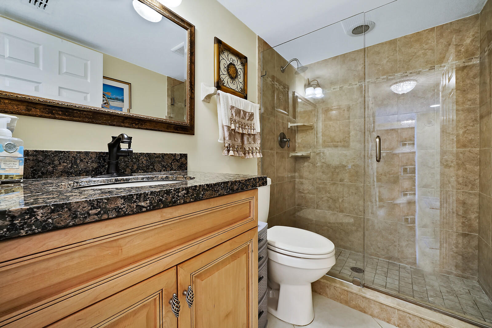1055 Ocean Drive, Unit 401 Juno Beach, FL 33408 - Photo 27 of 31 Guest bath