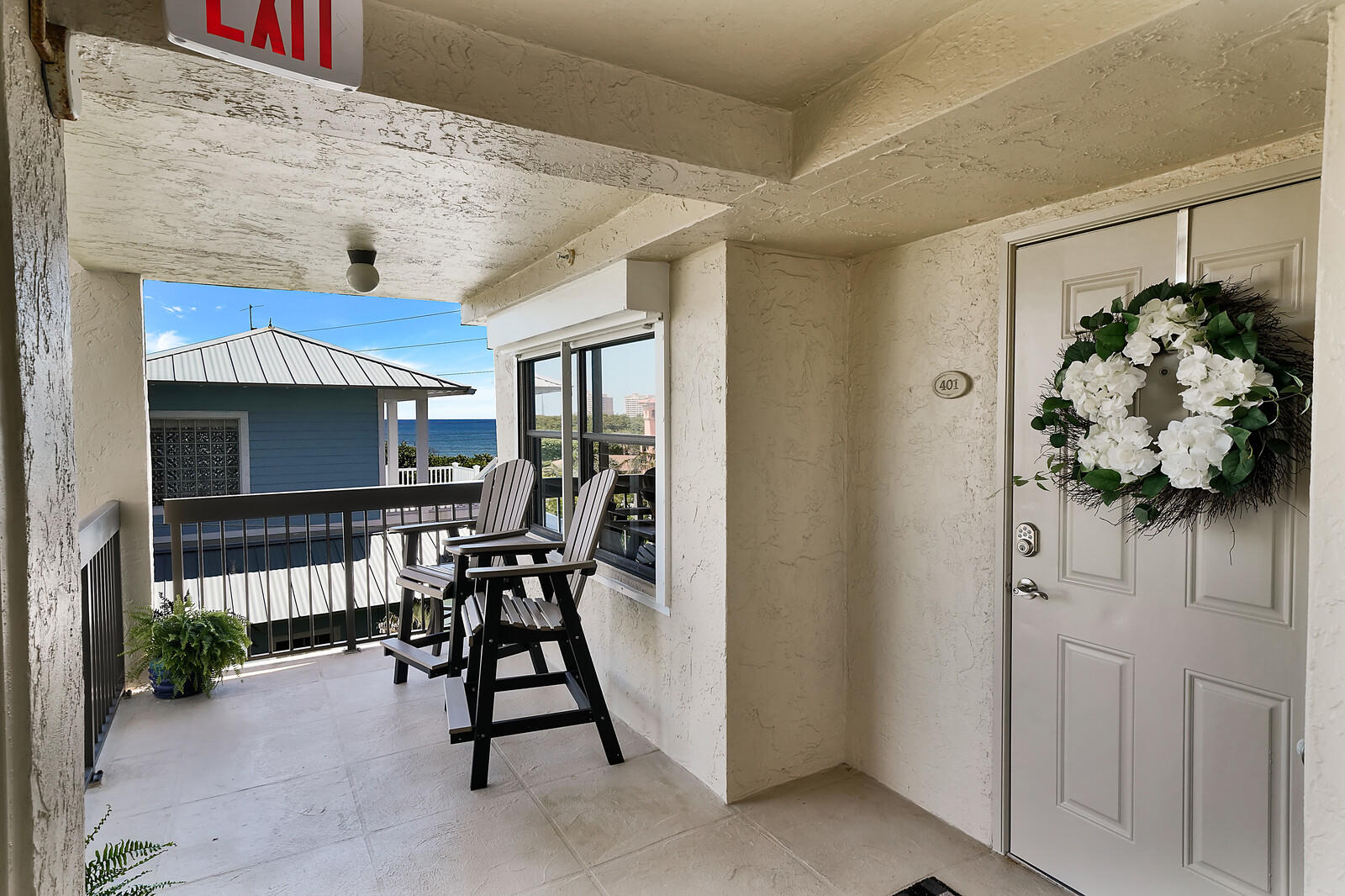 1055 Ocean Drive, Unit 401 Juno Beach, FL 33408 - Photo 6 of 31 Front door
