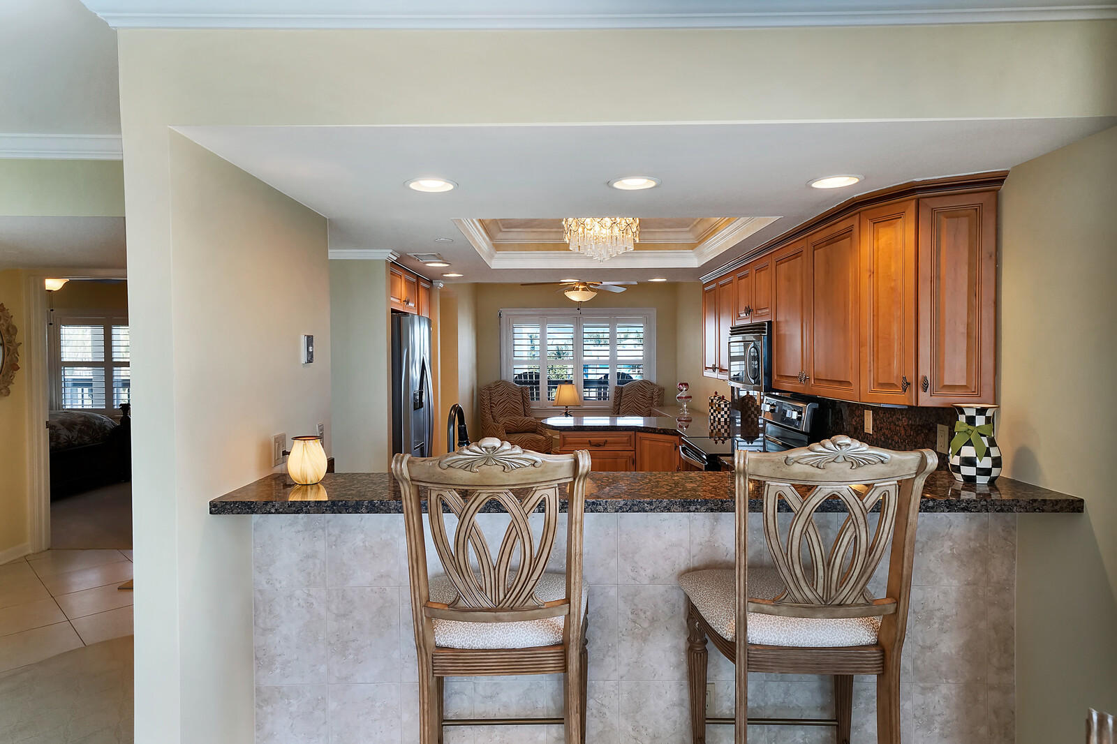 1055 Ocean Drive, Unit 401 Juno Beach, FL 33408 - Photo 10 of 31 Bar adjacent to the kitchen