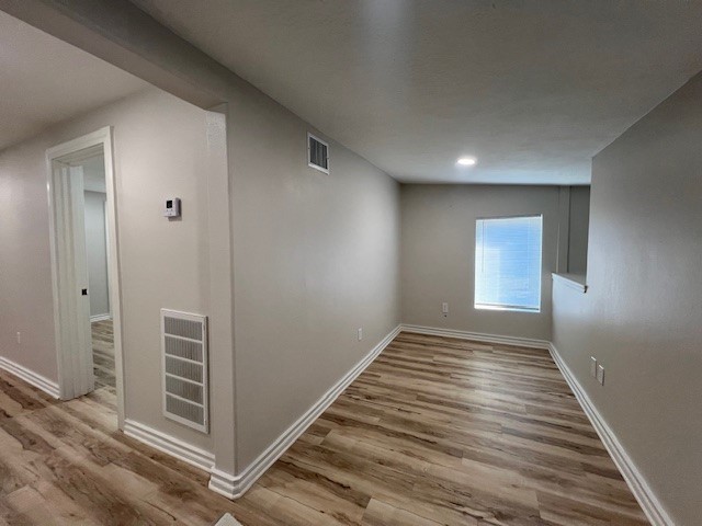 407 1/2 Walton Street Houston, TX 77009 - Photo 4 of 14 a view of a livingroom with wooden floor