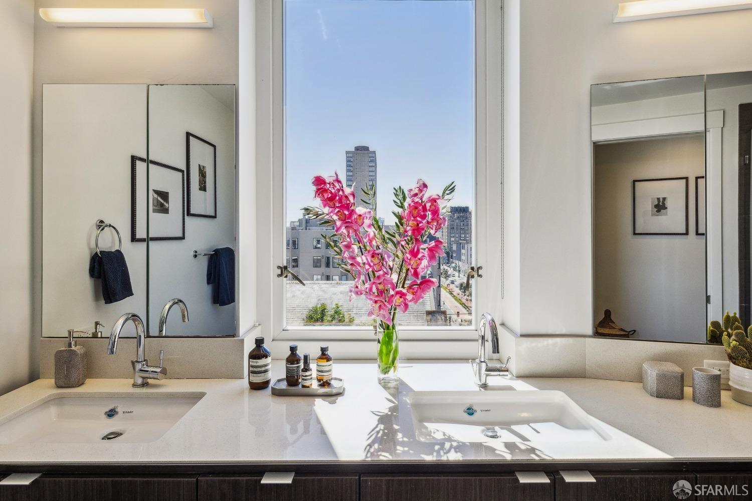 1788 Clay Street, Unit 807 San Francisco, CA 94109 - Photo 18 of 28 a bathroom with a sink and a mirror