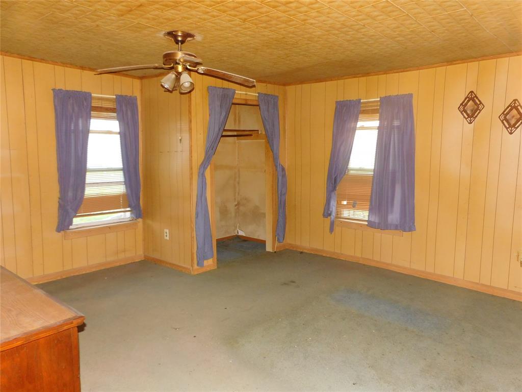 104 North Pecan Avenue Hubbard, TX 76648 - Photo 11 of 21 a view of an empty room with a window