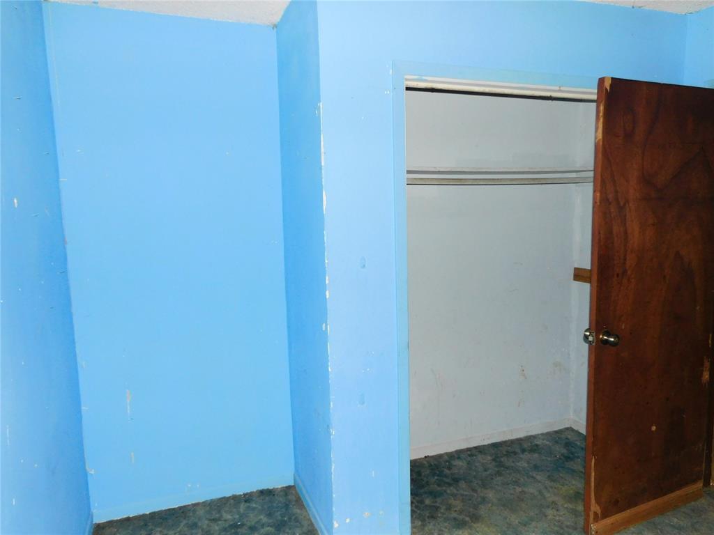 104 North Pecan Avenue Hubbard, TX 76648 - Photo 21 of 21 a white refrigerator freezer sitting in a kitchen
