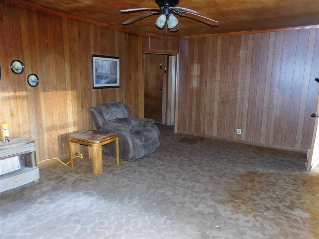 104 North Pecan Avenue Hubbard, TX 76648 - Photo 9 of 21 a living room with furniture and a window
