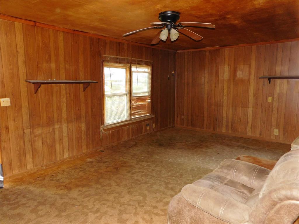 104 North Pecan Avenue Hubbard, TX 76648 - Photo 10 of 21 a view of room with a ceiling fan