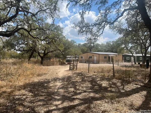 a house with trees in the background