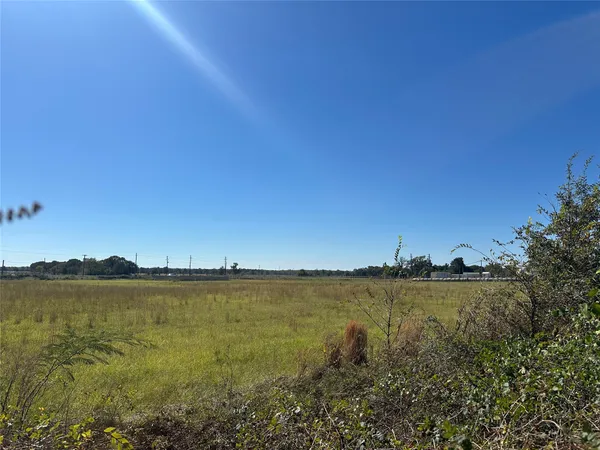 a view of a lake with a city