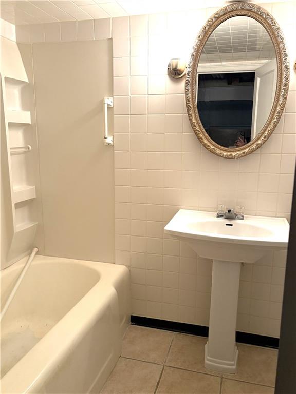 1920 Ridge Avenue New Kensington, PA 15068 - Photo 18 of 19 a bathroom with a sink and mirror