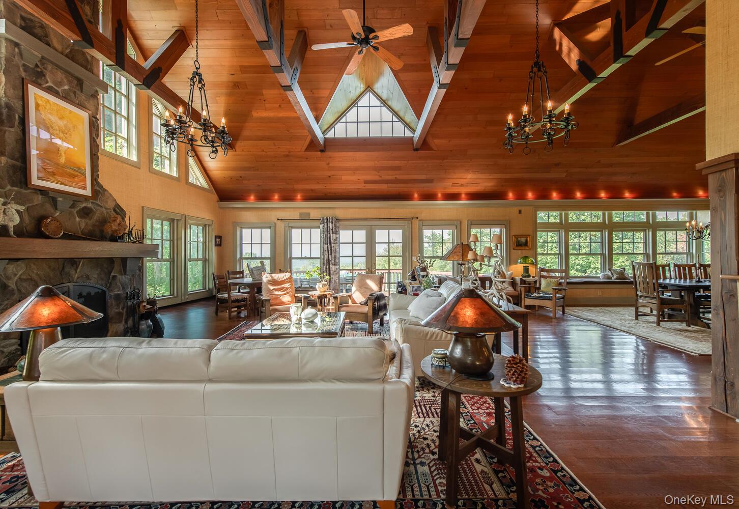 926 Turkey Hill Road Red Hook, NY 12571 - Photo 17 of 50 a living room with furniture a fireplace and wooden floor