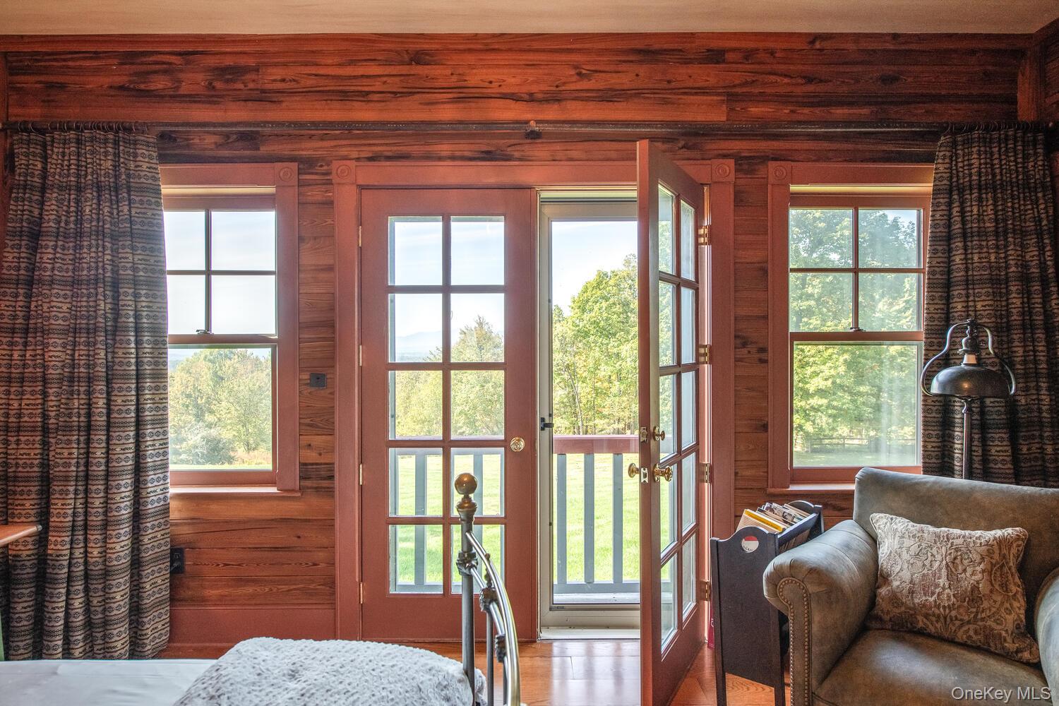 926 Turkey Hill Road Red Hook, NY 12571 - Photo 29 of 50 a living room with furniture and a window