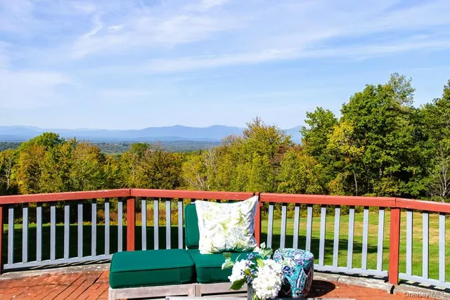 a view of a city street from a balcony