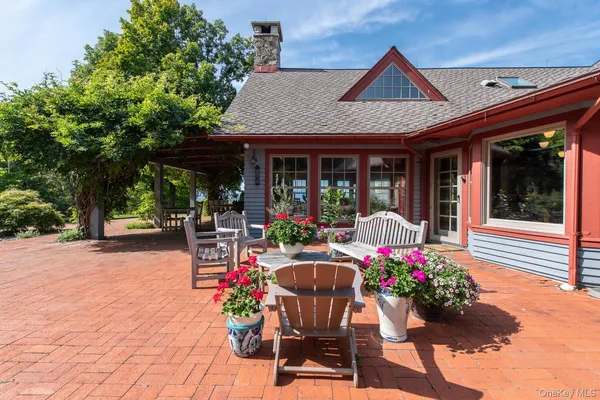 a front view of a house with patio