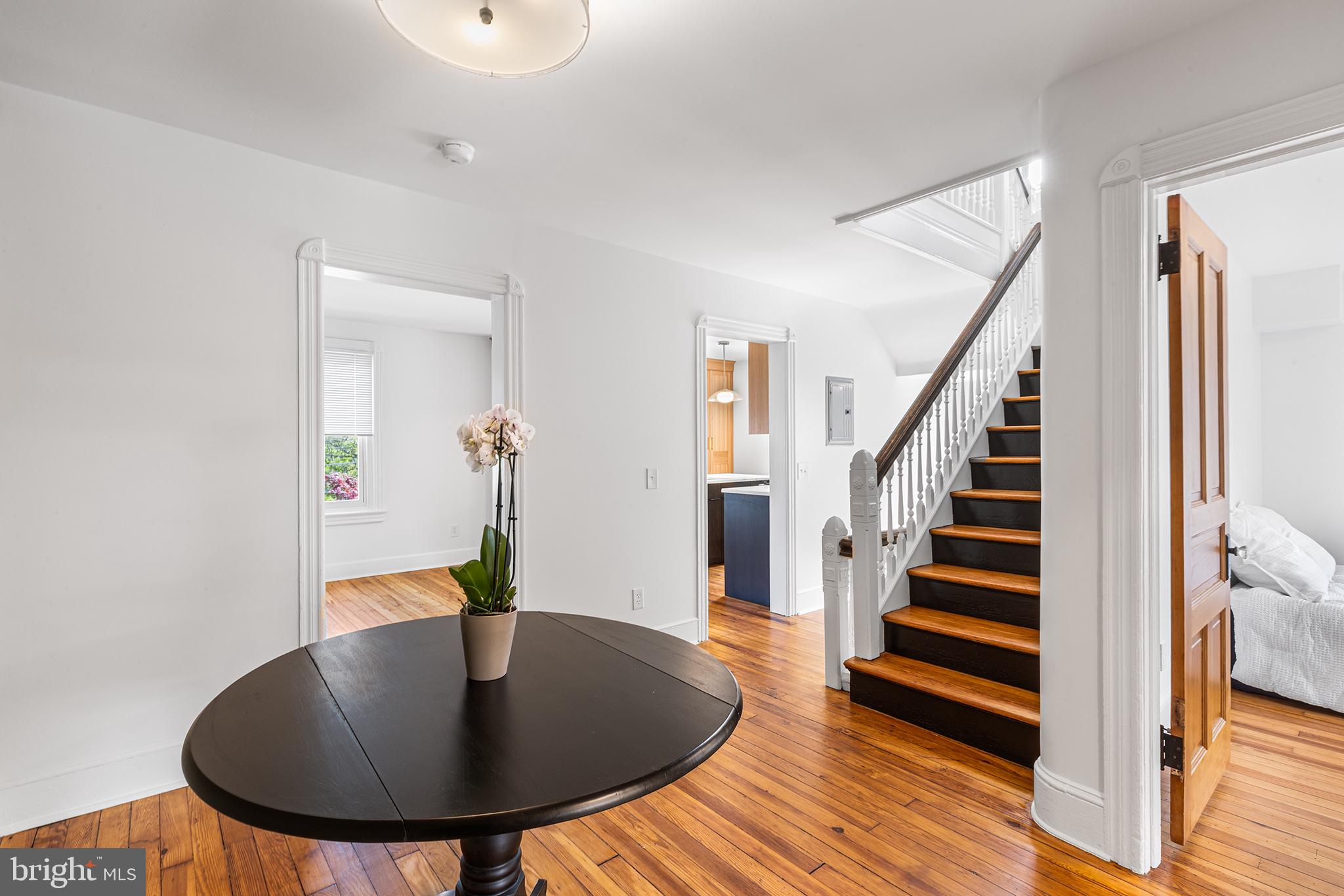 250 Conestoga Road, Unit 2 Wayne, PA 19087 - Photo 13 of 24 a view of entryway and hall with wooden floor