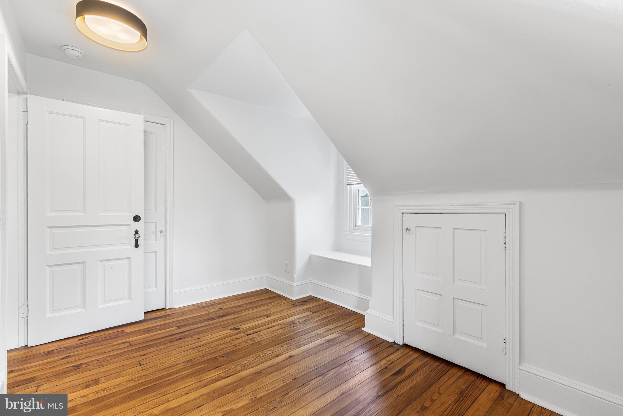 250 Conestoga Road, Unit 2 Wayne, PA 19087 - Photo 22 of 24 a view of empty room with wooden floor