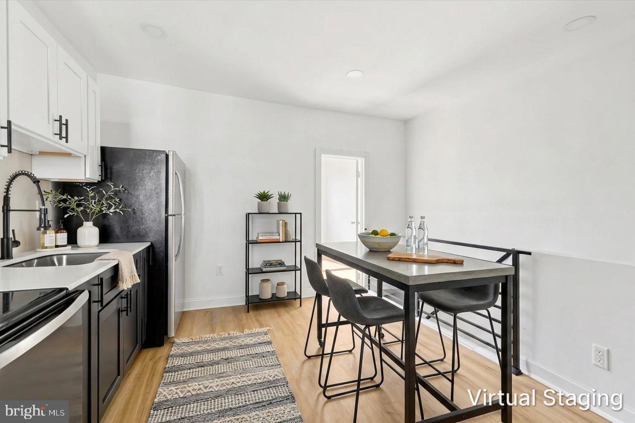 2046 South Norwood Street, Unit 2 Philadelphia, PA 19145 - Photo 3 of 17 Modern kitchen with sleek design.