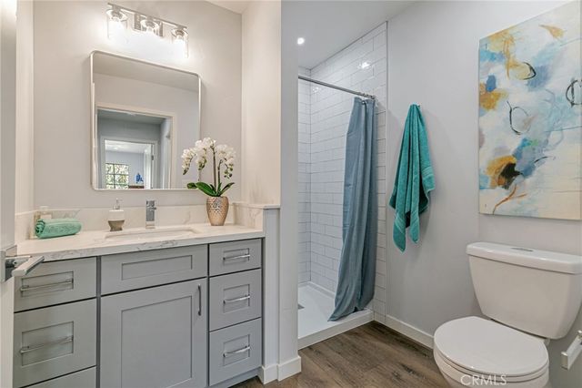 a bedroom with a bed and a table