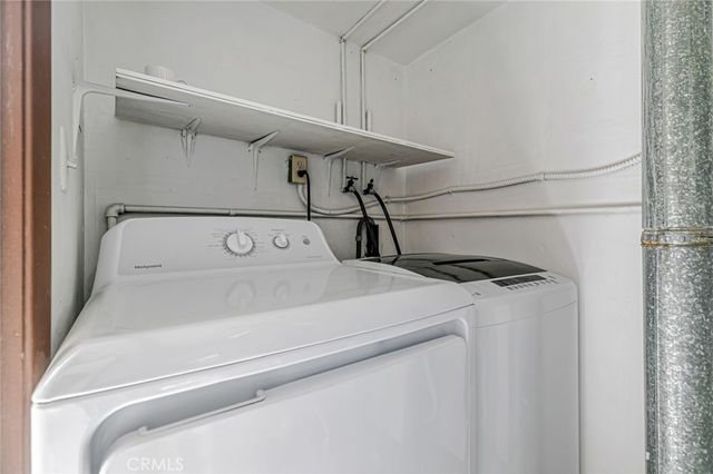 a view of balcony with furniture