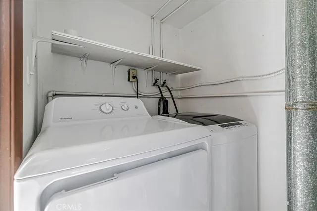 a view of balcony with furniture