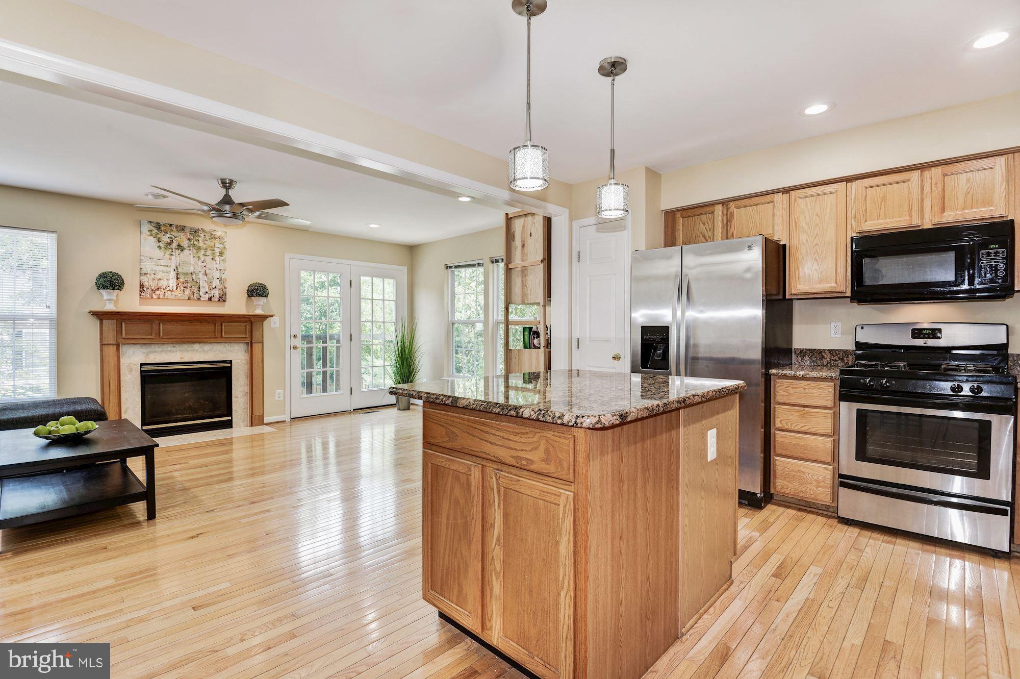 23017 Potomac Hill Square Sterling, VA 20166 - Photo 12 of 32 Kitchen opens to Family Room