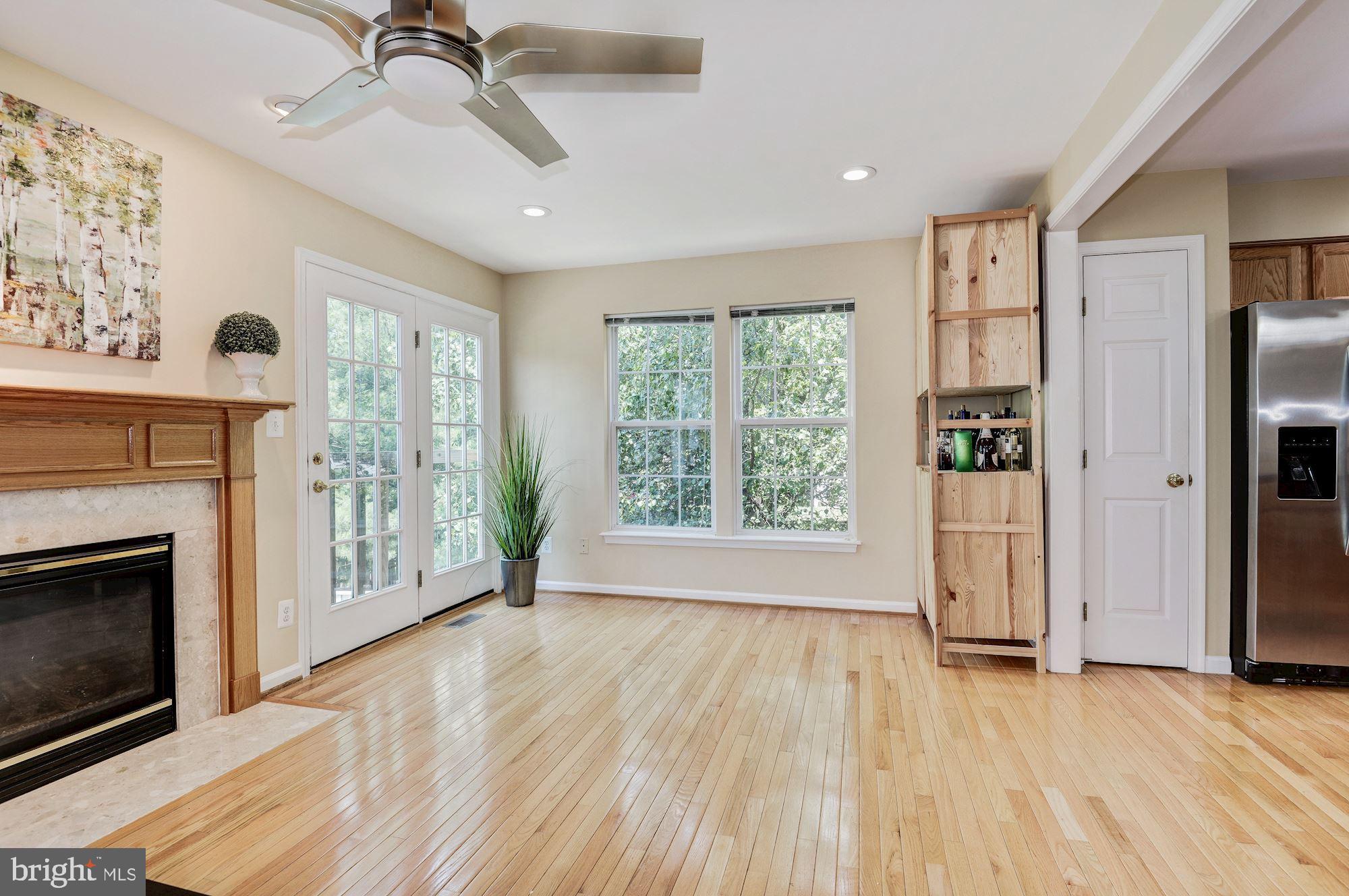 23017 Potomac Hill Square Sterling, VA 20166 - Photo 17 of 32 Family Room before Deck door install