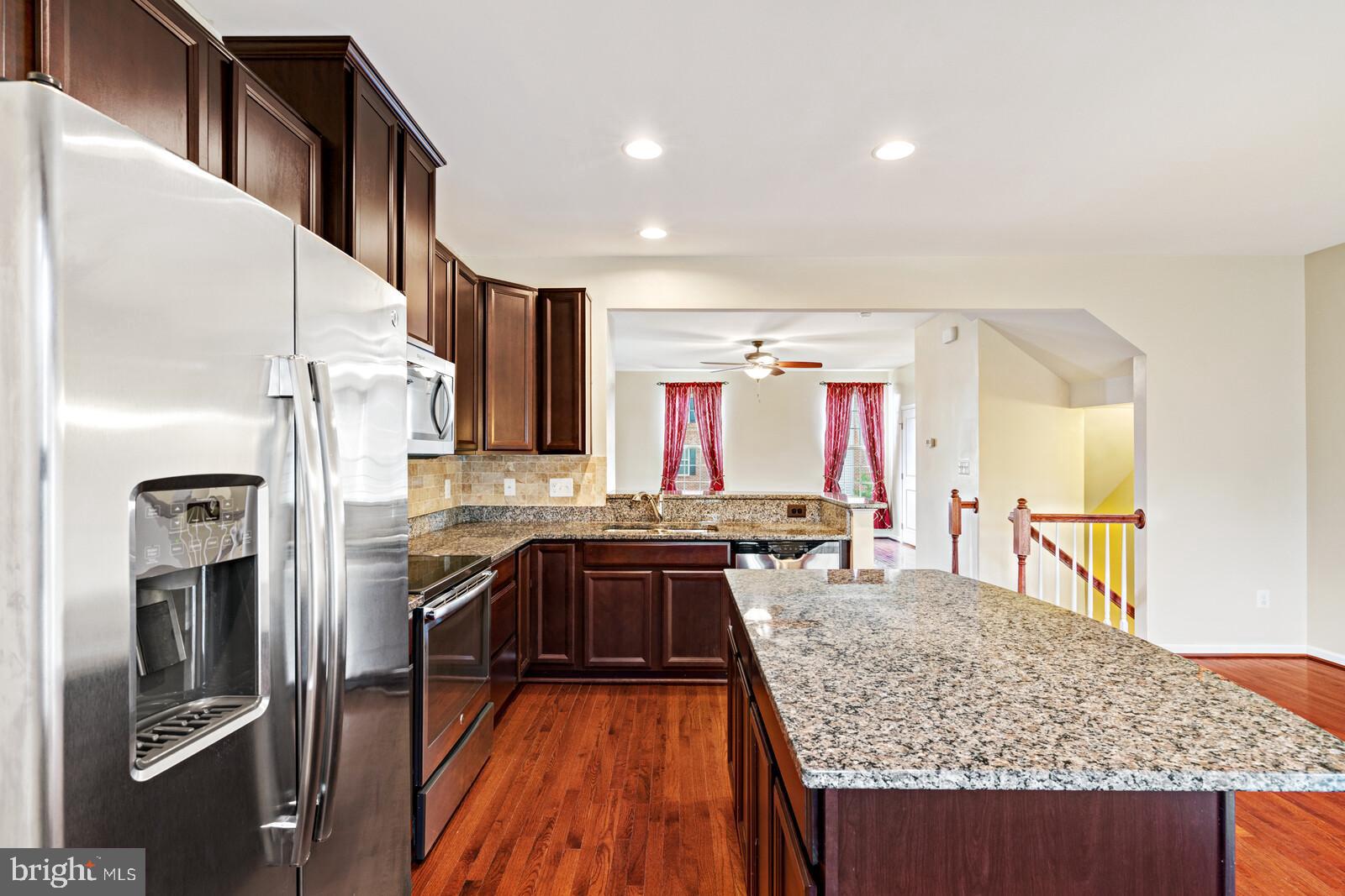 200 Brenton Road Fredericksburg, VA 22405 - Photo 12 of 33 Dining Rm, Kitchen, and Living Rm on mid-level