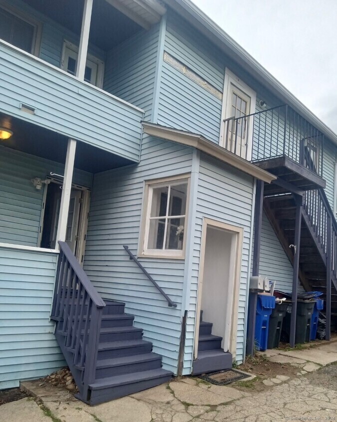 90 East Elm Street Torrington, CT 06790 - Photo 10 of 10 a front view of a house with a balcony