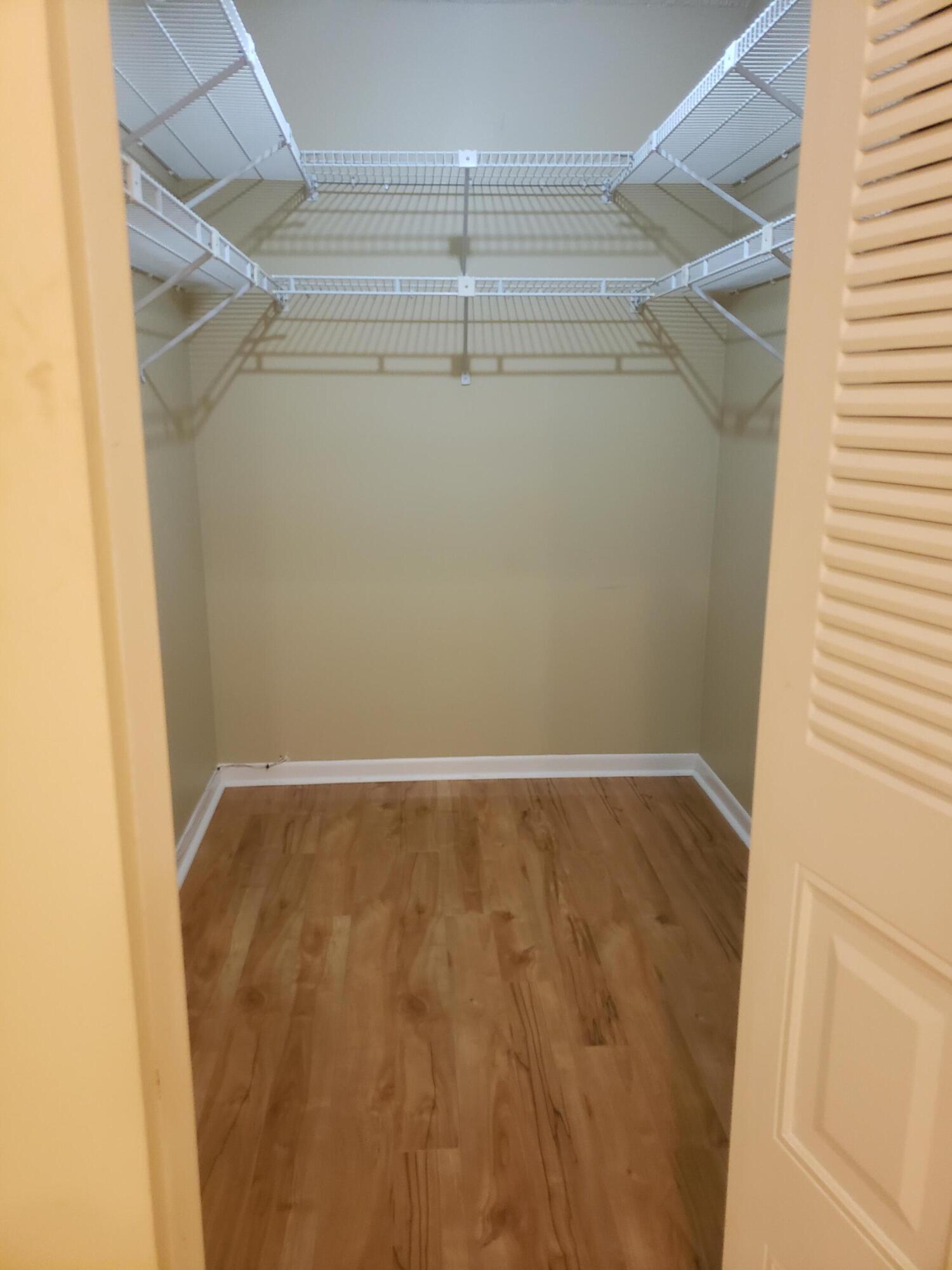 10875 Lake Front Place, Unit 10875 Boca Raton, FL 33498 - Photo 9 of 18 Master walk-in closet