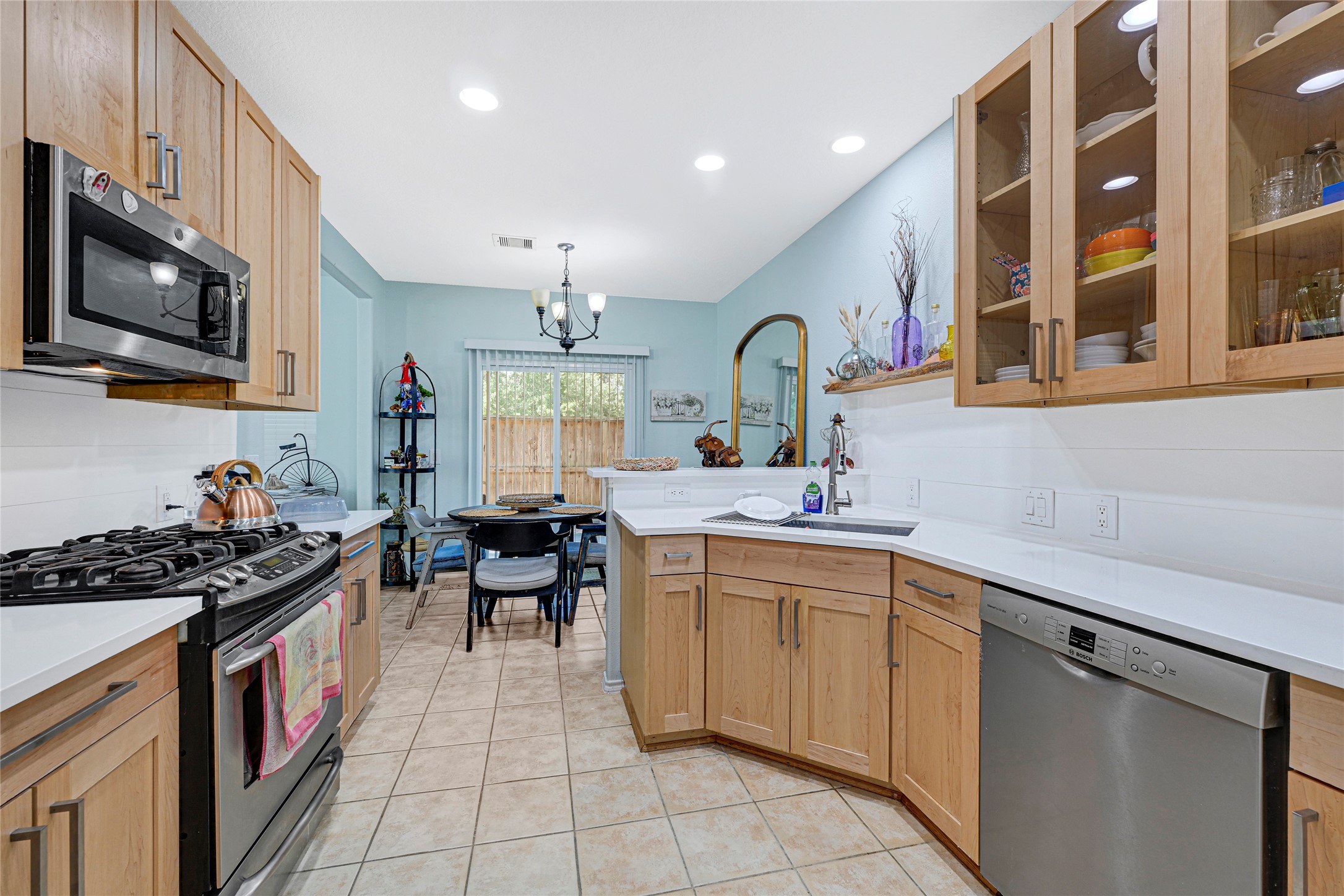 13600 Breton Ridge Street, Unit 4A Houston, TX 77070 - Photo 3 of 49 Well-planned kitchen layout for easy meal prep and storage