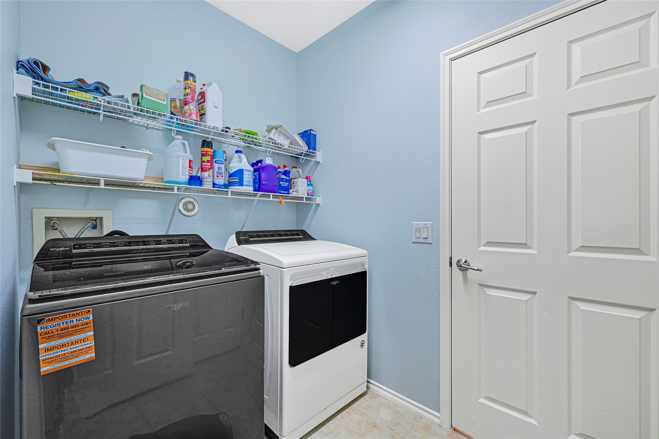 13600 Breton Ridge Street, Unit 4A Houston, TX 77070 - Photo 33 of 49 Dedicated laundry room with built-in storage