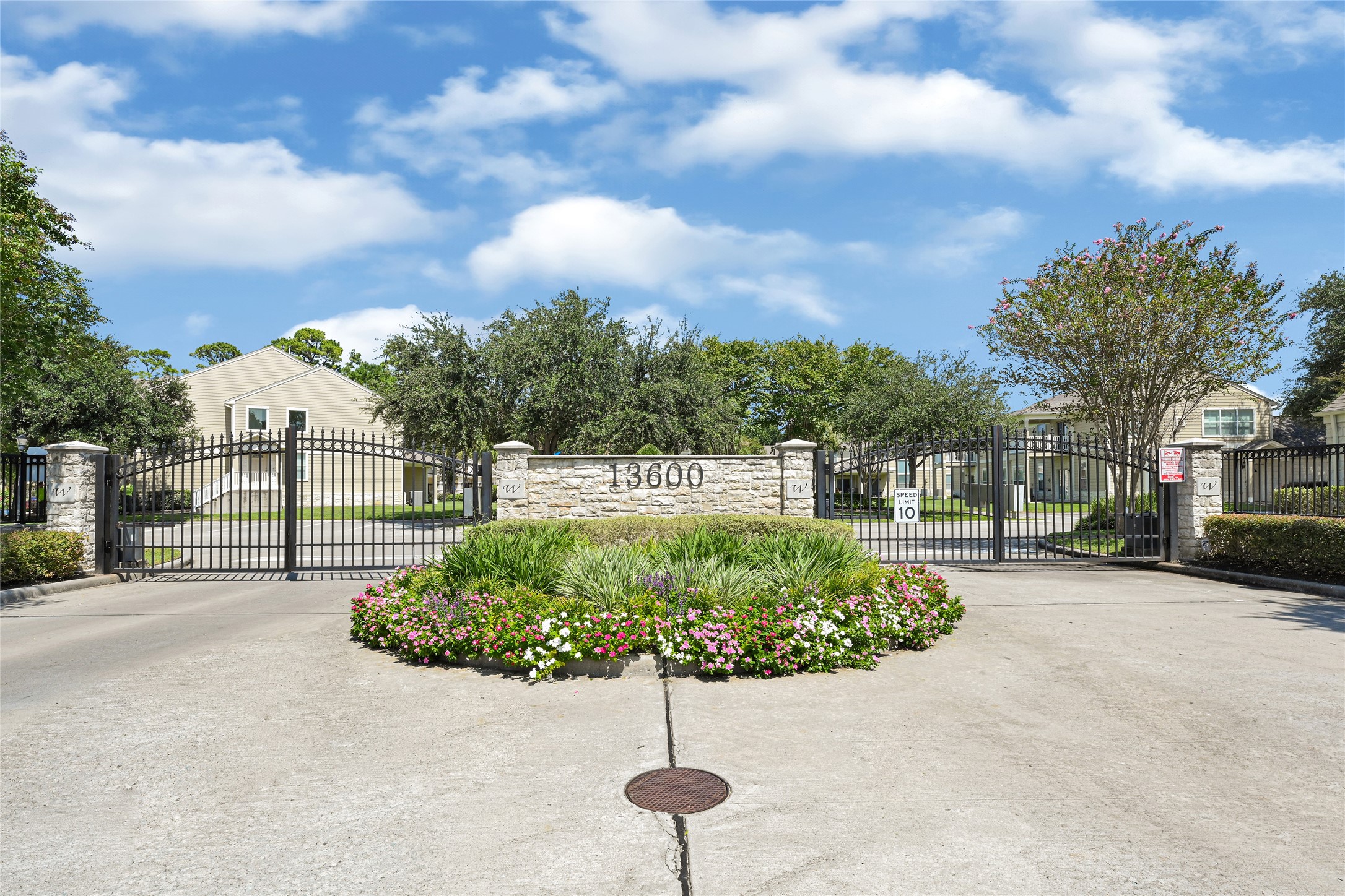 13600 Breton Ridge Street, Unit 4A Houston, TX 77070 - Photo 41 of 49 Secure gated access and well-kept common areas, enhancing peace of mind and curb appeal
