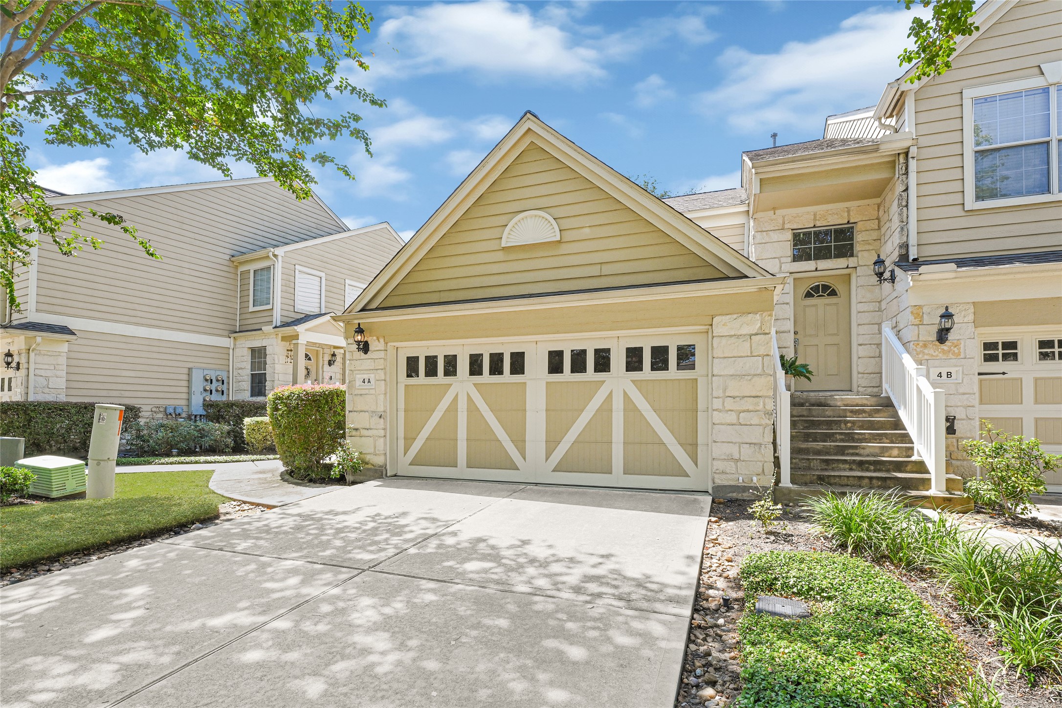 13600 Breton Ridge Street, Unit 4A Houston, TX 77070 - Photo 42 of 49 Spacious driveway leading to attached garage